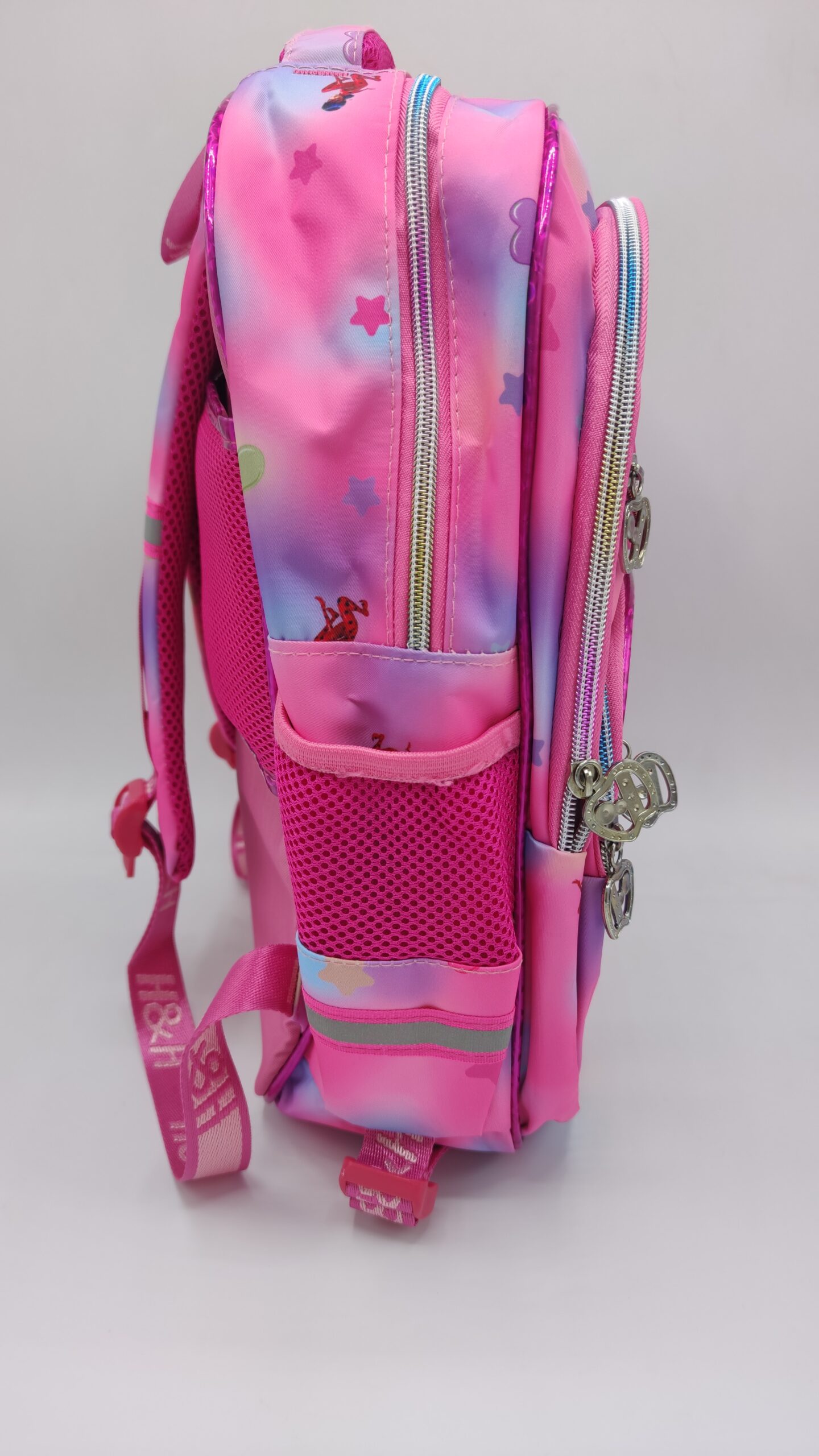 نمای جانبی کیف کوله پشتی مدرسه صورتی فروزن کد 9